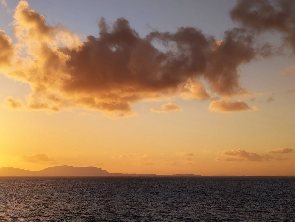 If you need time out from the awful news of war, death and destruction around the world... here's a gentle wash of hopeful golden sunset light for you.

View: over the sea to Skye.