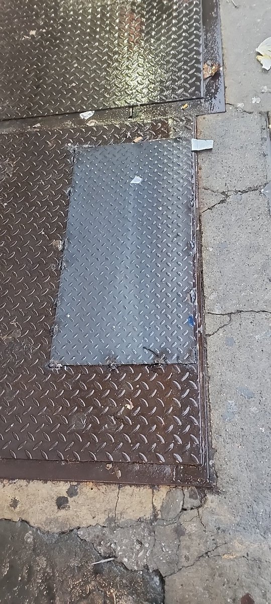 MrsPadooks08's tweet photo. @nyc311 @JasonLaboyPhoto Well, I would like too report it got fixed! I passed it this morning and a plate was welded. Ty @nyc311. https://t.co/n0PZcxszMT