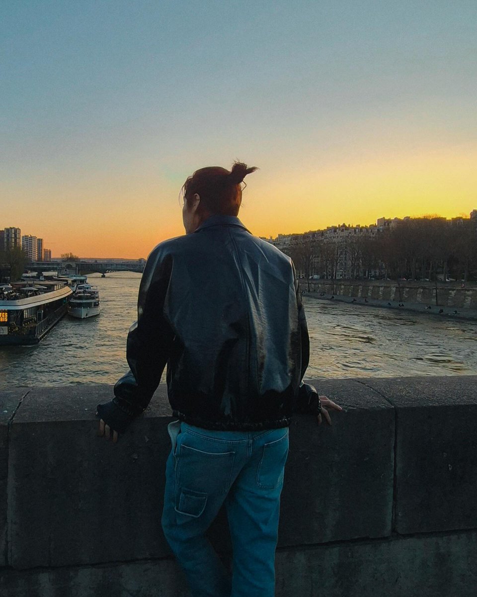 Sunset o’clock, where daylight folds itself into warm amber skies. The horizon glows softly, whispering that every ending carries its own quiet poetry before the night finally arrives.