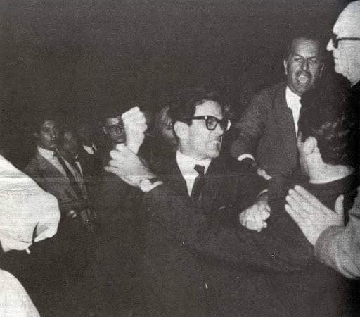 Pier Paolo Pasolini punching a fascist at the cinema in Rome in 1962.