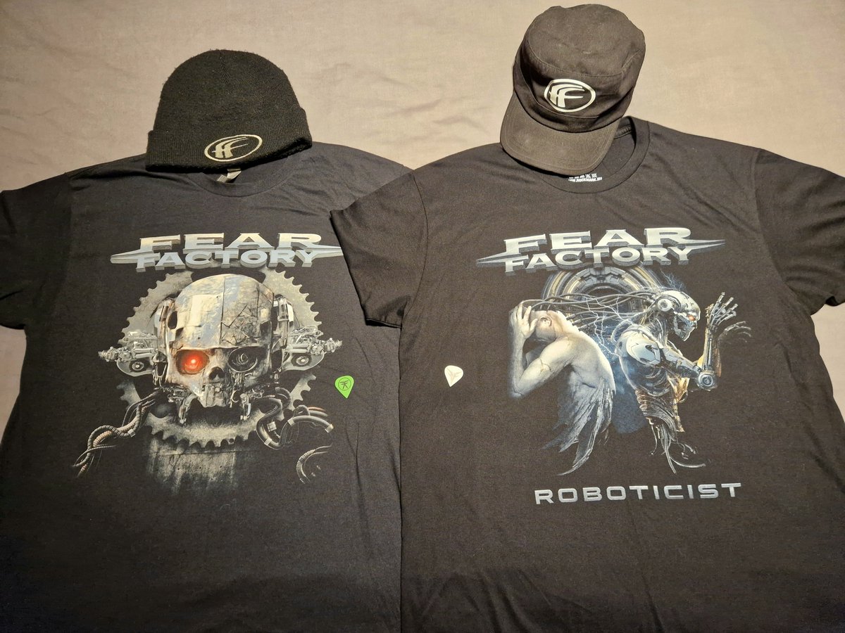 Here are the two Fear Factory tour tops I own.
The two picks <a href="/DinoCazares/">Dino Cazares</a>  threw to me are so awesome to have, he likes my glowing green hair! 
Can't wait to see them again and to get my hands on the new album! 

Fear Factory Forever 🤘🏻😝🤘🏻

<a href="/FearFactory/">Fear Factory</a>
