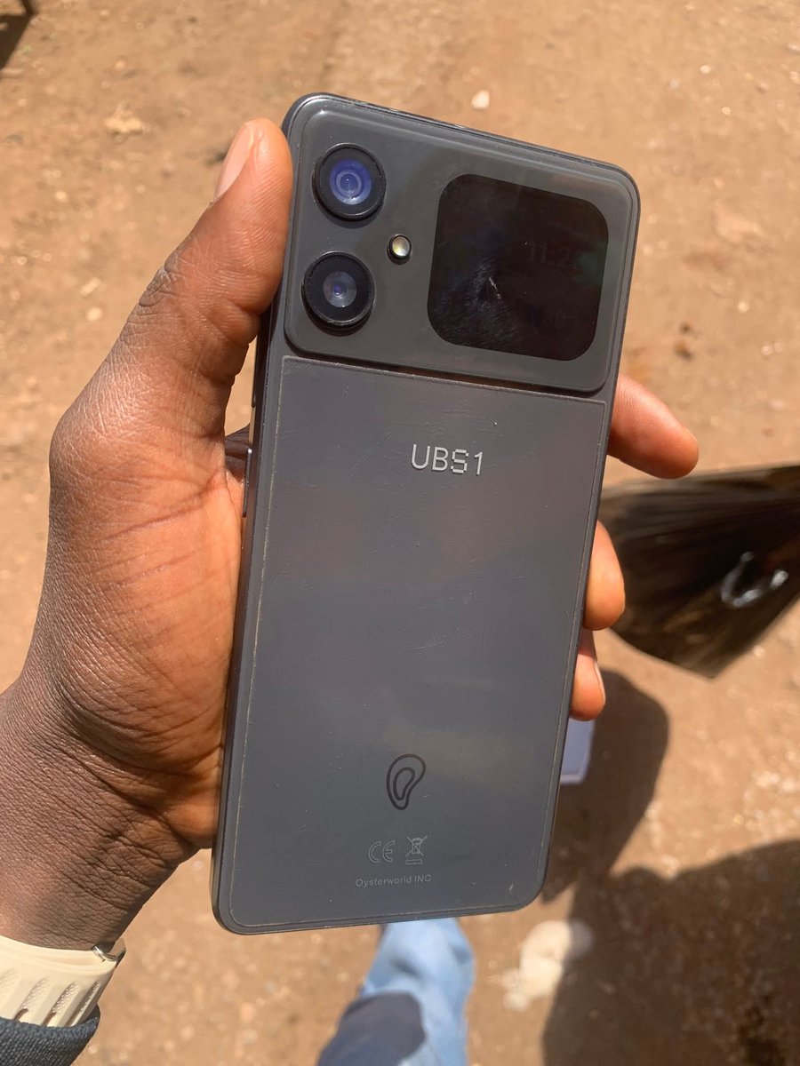 SlimNazi's tweet photo. I left Kagoro for Jos few minutes to 9 last night.

I was in Kafanchan over the weekend for a funeral and yesterday I had to go inspect a farm and then attend a meeting so I left very late

Normally, I don’t move with my UBS1 blockchain phone. But lately I’ve been enjoying the wide screen for games. Even inserted a SIM recently (that decision saved me, but wait first).

So while packing for my trip last weekend i decided to carry the phone along, just in case I get bored at any point.

By 7pm last night I was still in Kafanchan waiting for a car to Kagoro. I brought out the phone from my backpack and started playing football. Played all the way to Kagoro. 

We got to kagoro and i got into the front seat of the car taking us to Jos. We had to wait for another long time so that we can be at least 3 passengers for the car to move. The driver was very nice and friendly so we got chatting. 
In fact we chatted all the way to Jos while enjoying good music so I just put the phone in the pocket of my jacket instead of returning it to the backpack. 

We even exchanged contacts with the driver  
 
One of the passengers dropped around Haita so there was only one person in the backseat. Somewhere around Vom, we picked three men returning from hawking fried fish. 
I even bought fish but didn’t pay immediately since we were still in the same car.

We got to the front of Bukuru park, I dropped, and found my way home.

It was when I reached my gate that it hit me I didn’t pay for the fish. I felt bad, but there was nothing I could do at that point.

I Slept.

Morning came.

As I was stepping out for work then boom.

“Where’s my UBS1?”

Omo.

Everything started spinning.

Ah! My crypto machine wey i never really chop from!

Now, remember the sim i inserted in the phone? I didn’t know/have the number. So I didn’t bother even calling the phone 

I retraced my steps. Called the driver. He said he even washed his car this morning before going to the office and there was no phone.

Na so I quickly start dey scan my head and phone o. And i somehow found the number of sim in the phone. 

I called the number

It rang. No answer

Second call, someone answered.

It was Ibrahim, one of the fish sellers we picked at Vom. He saw the phone when they were dropping and told himself, “This phone no be driver own.” So he took it home expecting the owner to call. Even charged it overnight so the battery wouldn’t die.

He asked me to meet him at Bukuru market before 11am because he was heading to another market after frying fish.

He even joked about how he  thought I had exchanged my phone for the fish i bought from his colleague. 

Funny guy 

Ibrahim literally guided me on phone through the market till I found him.
One man there who they all called ‘chairman’ made sure I confirmed I was the owner by making me unlock it in front of everyone. Then they all gathered to examine the “phone with another screen at the back.” 😂

One of them said this was the third  missing phone Ibrahim has returned.

I paid for the fish and tried to give him extra money to appreciate him.

He refused.

I was stunned. Ended up staying almost 20 minutes just chatting with them about their business.

Gaskiya… good people still dey this Nigeria.

Please leave a prayer for the very kind Ibrahim.

Credits - James job(Facebook)