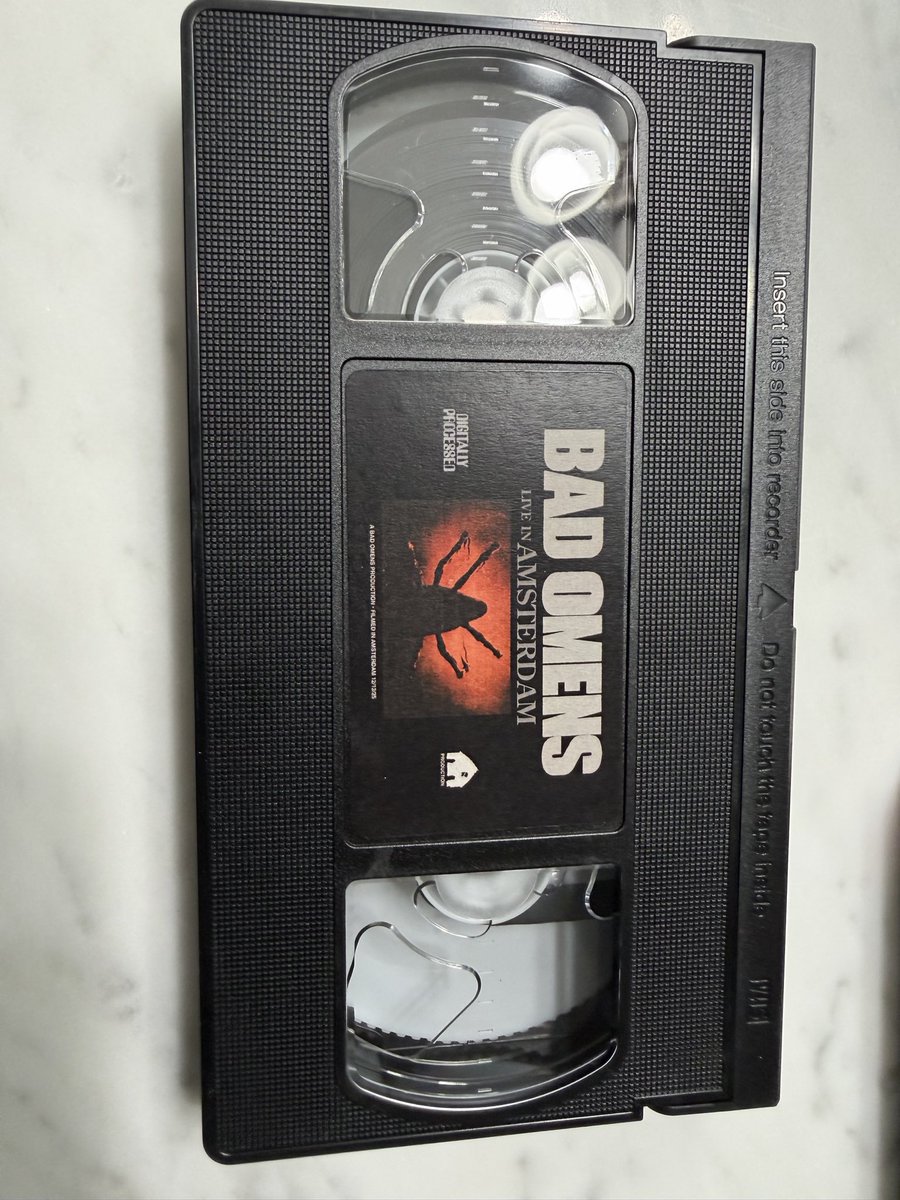 One of the coolest merch ideas! Can’t wait to play it on my VCR! <a href="/badomenscult/">BAD OMENS</a>