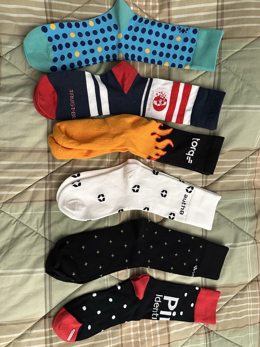 collects colorful socks giving away by cybersecurity vendors at today’s cybersecurity summit in Dallas.