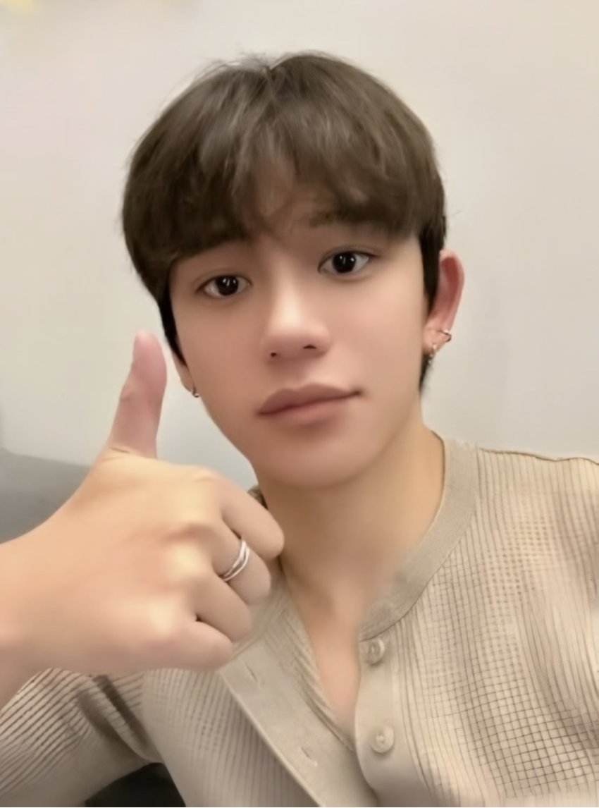 Lucas debuts a new hairstyle, color, and piercings in a newly shared photo, sparking speculation about a possible comeback soon.