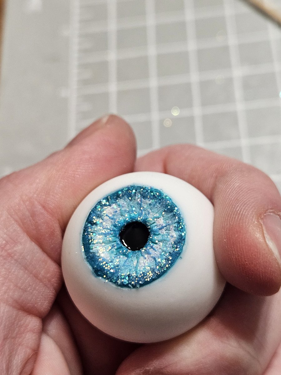 fluffle_cat's tweet photo. Sighhhhh I keep trying to experiment with resin to make myself a set of gojo eyes but clear resin is sooooooo annoying so they keep getting ruined when I try to put the final coat on them 🙄🙄🙄 https://t.co/2XlyOzh8dl