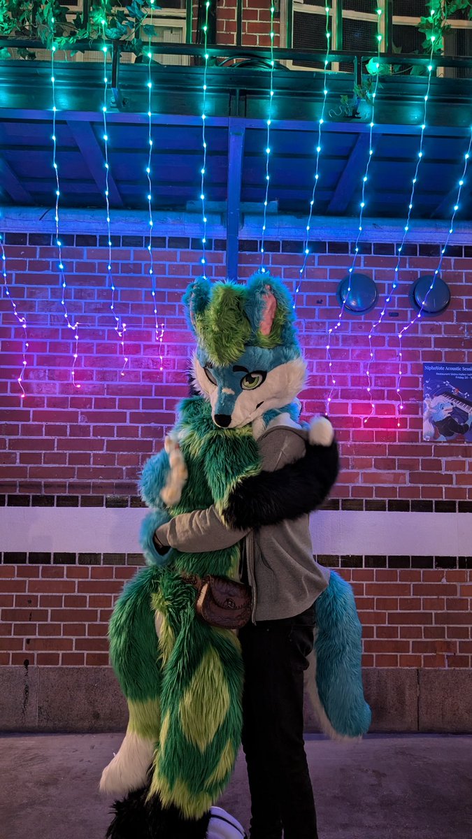 Fluxfoxx_'s tweet photo. Who's this? It's @KettuFloof at #NFC2026. Happy #FursuitFriday! I wanna go back on hoilday 😭

Nice meeting ya! We should hang out more! 💚

#furry #fursuit https://t.co/DMWKGzOqa8