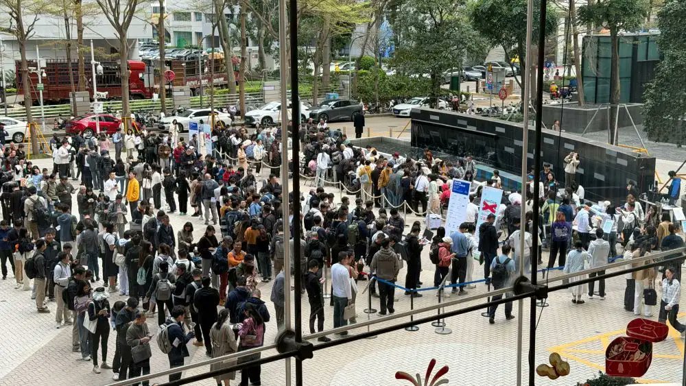 EmilyLWeb3's tweet photo. The OpenClaw craze in China is absolutely unreal right now

Today, right outside Tencent HQ, more than 20 engineers set up a literal street stall to offer free, on-the-spot OpenClaw installs for anyone passing by.

And the wildest part? The people lining up weren’t just the usual tech crowd. There were people in their 70s from the intangible cultural heritage world, retired aviation engineers in their 60s, and moms holding 2-year-olds.

This is no longer just a tool for power users. It’s breaking out into the real mass market, in real time.