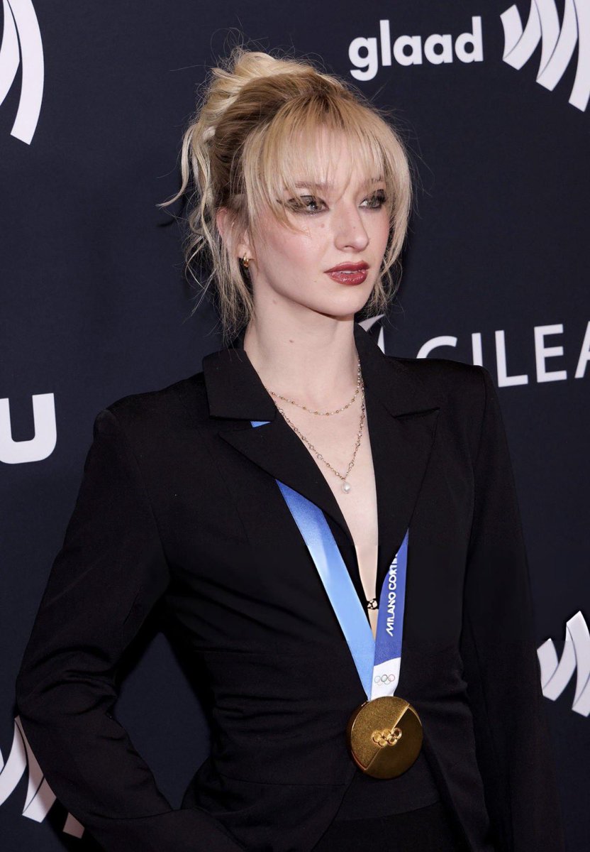 She looks like a gay vampire and I’m very here for it