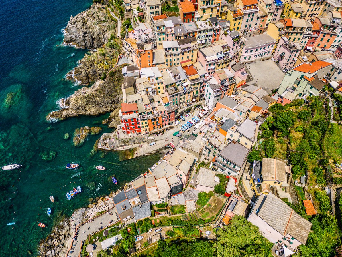 Riomaggiore: istockphoto.com/portfolio/bob_… #Italy #CinqueTerre #Italian #Riviera #Riomaggiore #Mediterranean #sea #port #village #town #aerial #history #architecture #colors #boats #sailboats #coast #travelpics #travelphotos #summer #vacation #destination #gettyimages #stockphotography