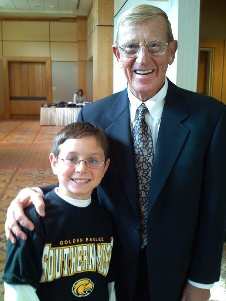 Here is my son Alex with Coach Lou Holtz who spoke at an event at the Birmingham Bowl, the last game Coach Jeff Bower coached for Southern Miss. Coach Holtz was a first class man and Coach.
