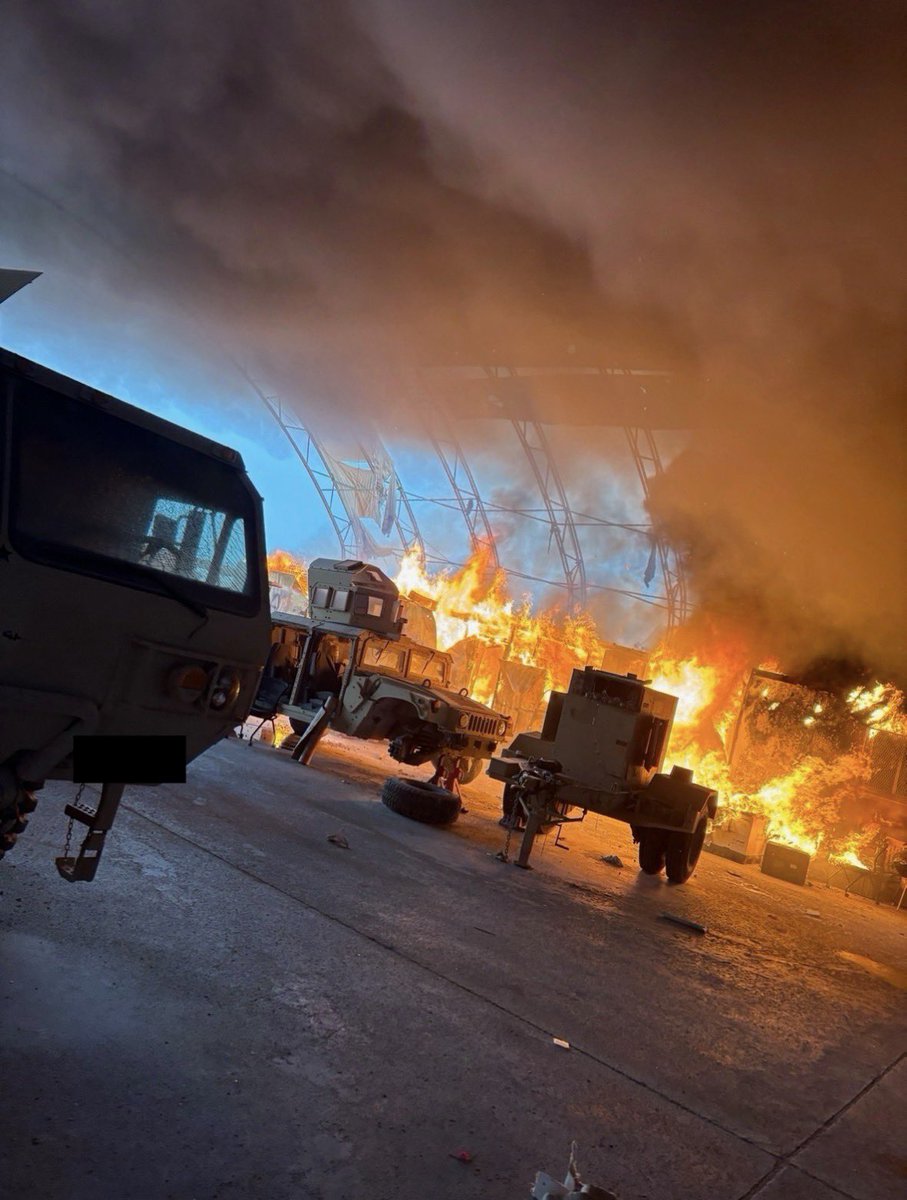 Accurate hit on a hangar housing an air defense system in the UAE.

I wonder if this Patriot site at Al Minhad Air Base or this is the one in Umm Al Nar (or another one).