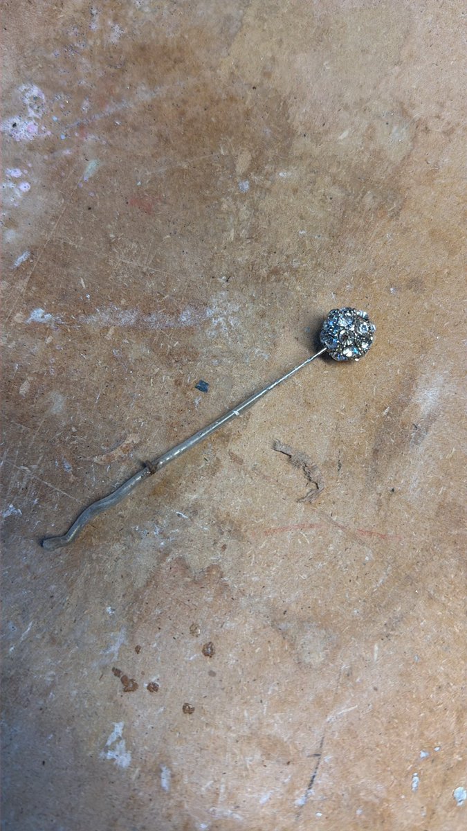 DrMonsignor's tweet photo. My wife had this in her hair on our wedding day.   I now use it to poke holes in superglue containers.   #romance https://t.co/3VDQ6hpH02