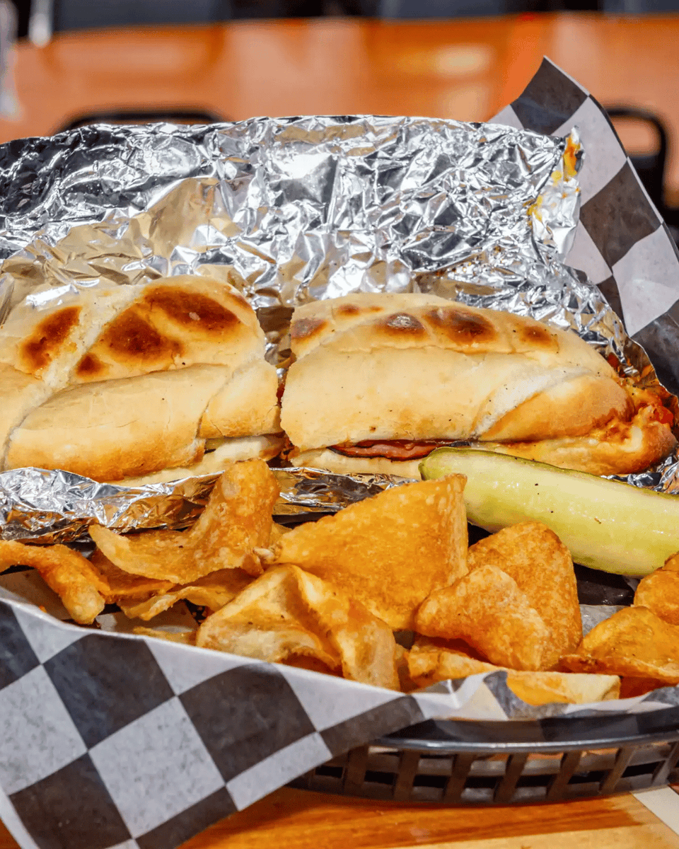 Our Original Gaslight Sub combines three cheeses, ham, and gyro meat for a satisfying bite you won't forget. Come hungry and leave happy! gaslightpizza.com