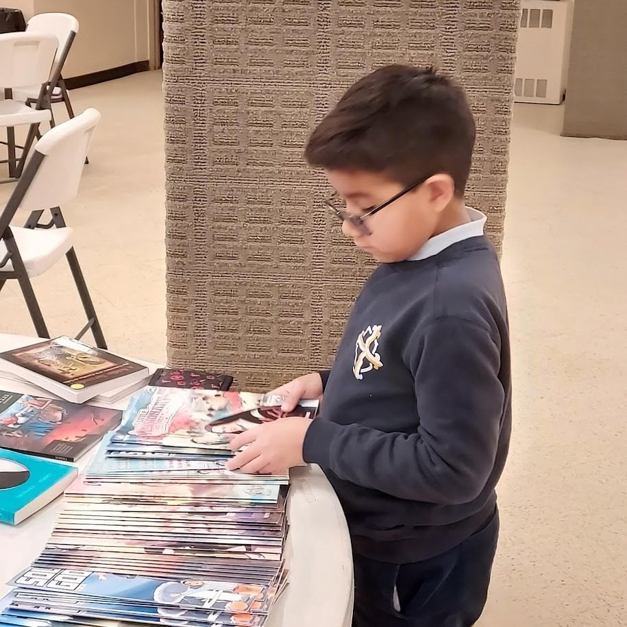 spv_ri's tweet photo. The 2026 St. Pius V School Book Fair is live! 

There will be extended hours after school today until 3 PM and after the 10AM Mass this Sunday. https://t.co/XShl23dT7y