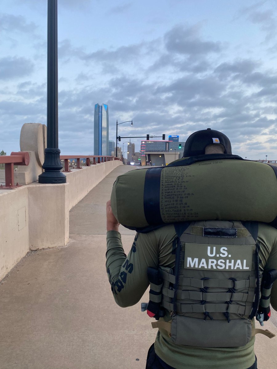 USMSOKC's tweet photo. Did you see us this morning in downtown OKC? Deputies from the OKC office were participating in the Marshals Service annual Hero run. Every March, Deputies from across the country run 3 miles in gear to honor fallen Deputies and Special Deputies. #USMarshals #2026HeroRun https://t.co/wNnk6XsLcU
