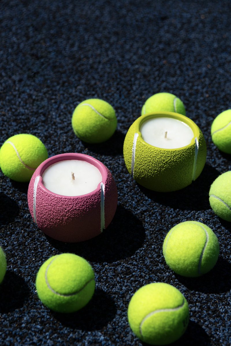 I love when all my interest and hobbies collide because… now we get TENNIS BALL CANDLES!
