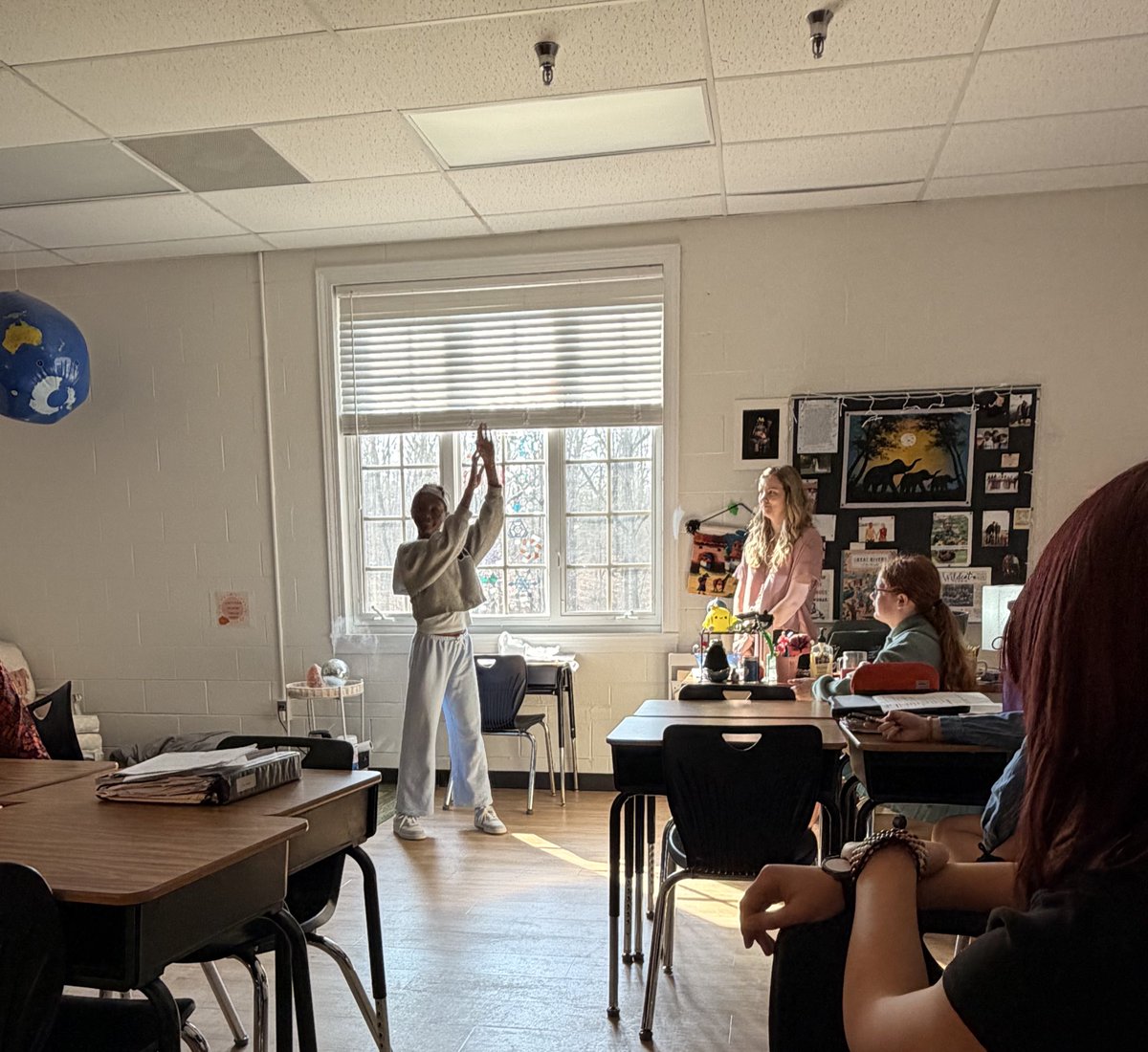 WCDS_Middle's tweet photo. Softly shooting a basketball? Maybe quietly playing monkey in the middle? How about aggressively passing the ball? Seventh grade language arts students were acting out adverbs today in class #WCDSMiddleSchool #WCDSAcademicExcellence https://t.co/r7f7cEaByu