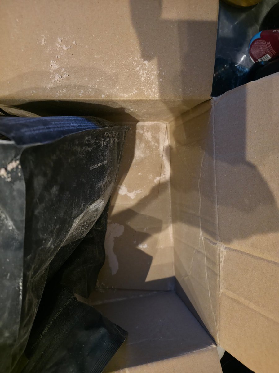 Draykill's tweet photo. @TheProteinWorks well this is the last ditch attempt of contacting you, tried messaging and emailing but got no response. 
As you can see the bag was delivered busted and a good portion in the box (more over the floor) https://t.co/StR1vonxGZ