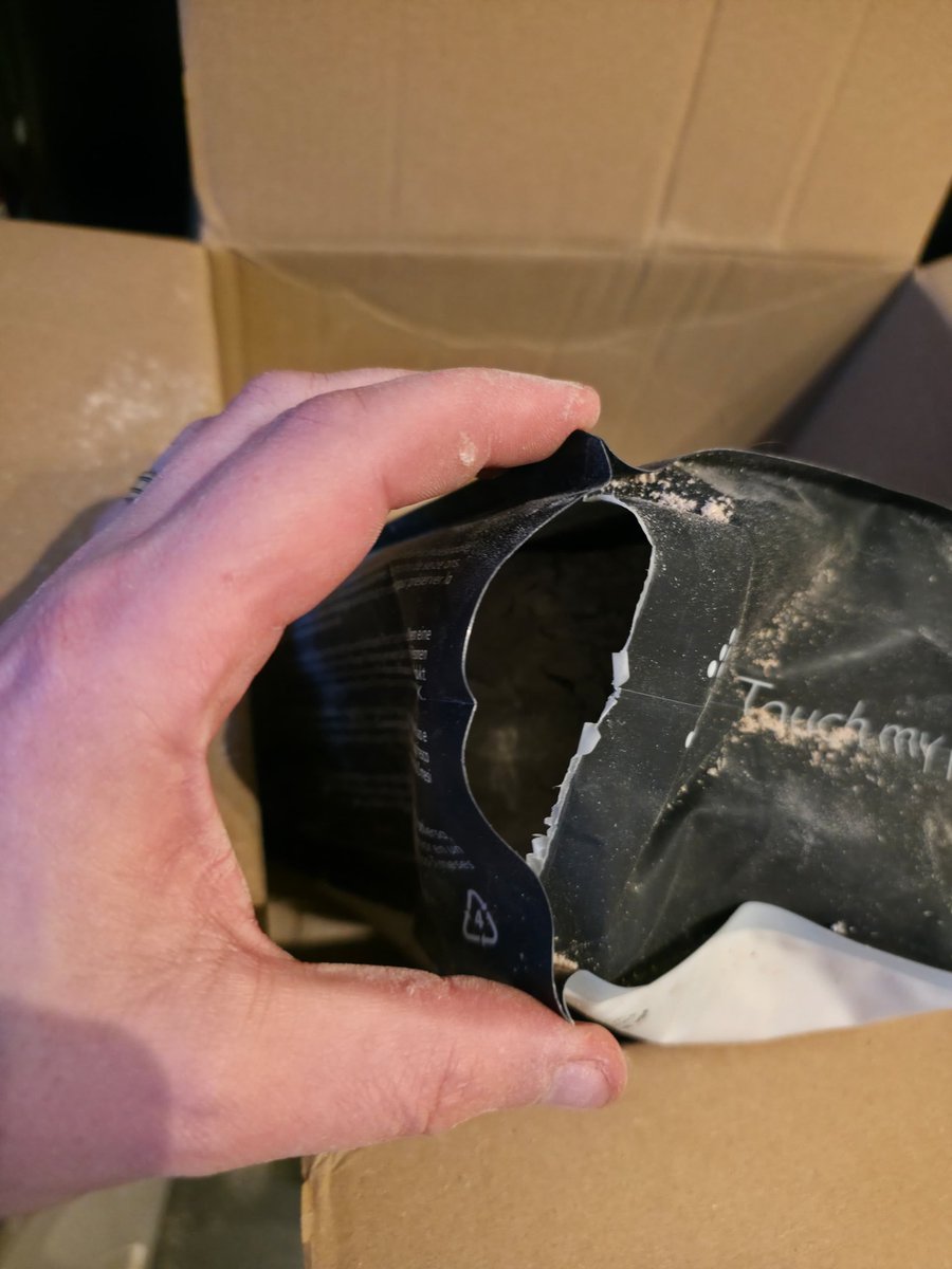Draykill's tweet photo. @TheProteinWorks well this is the last ditch attempt of contacting you, tried messaging and emailing but got no response. 
As you can see the bag was delivered busted and a good portion in the box (more over the floor) https://t.co/StR1vonxGZ