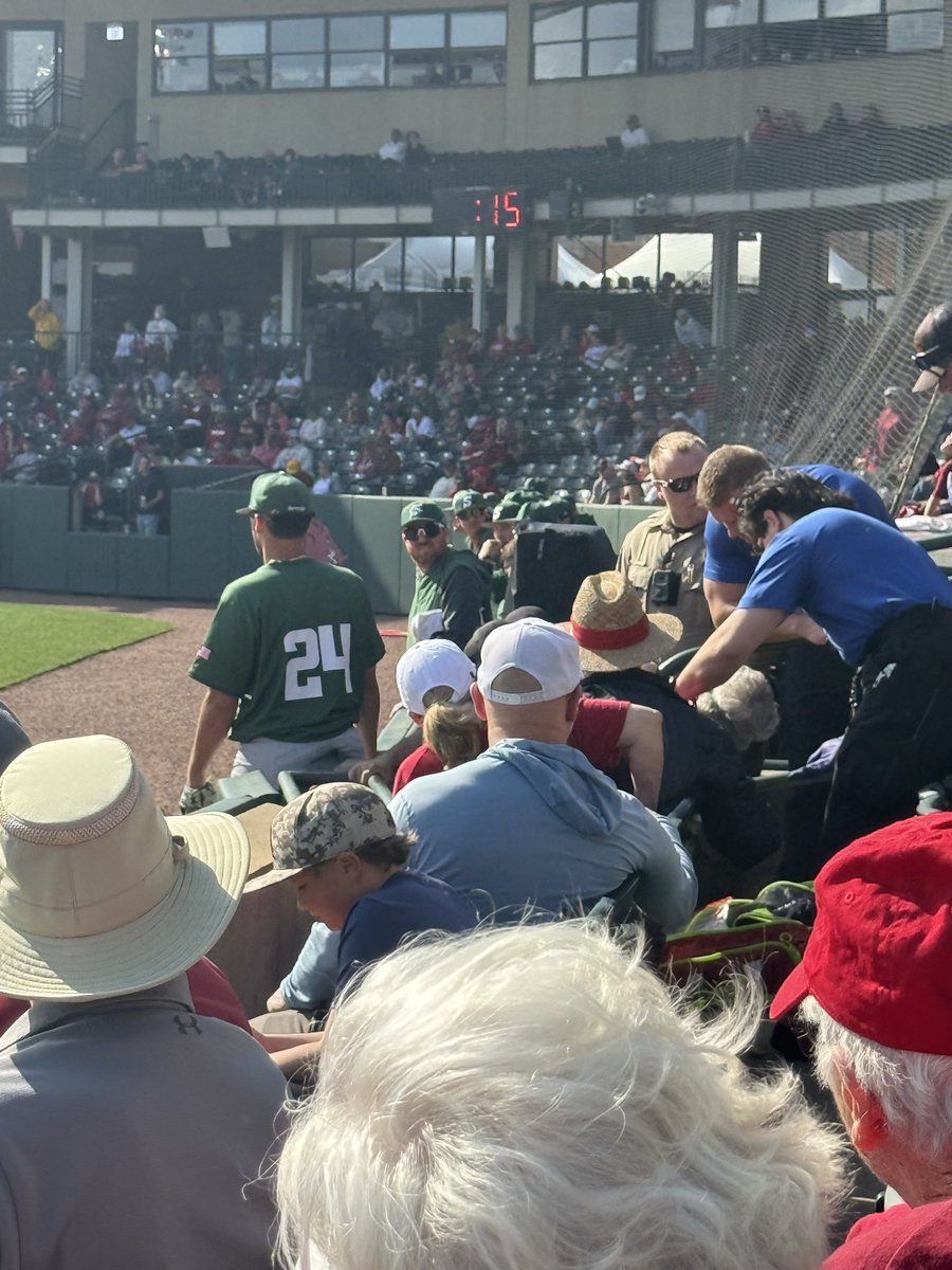 JamieThornton22's tweet photo. First class move by the @StetsonBaseball team. Fan at @BaumStadium requiring medical attention almost hit with foul ball. They jumped into protect the fan. @RazorbackBSB #morethanagame https://t.co/h4LMOLh3gF