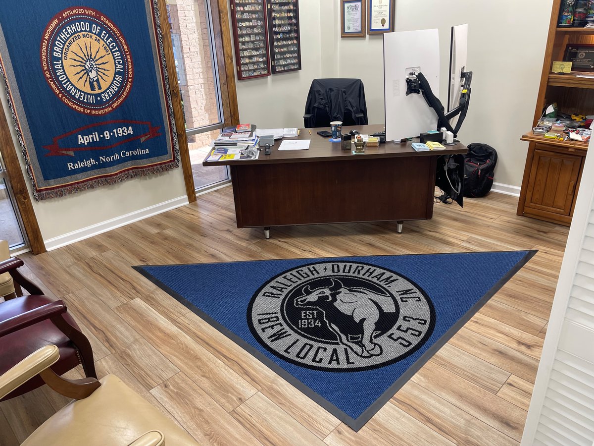 RugRatsInc's tweet photo. Custom shapes that make a statement! ⚡️

Check out these new Piazza Logo Mats we just delivered for @IBEW553 in Raleigh/Durham. From classic rounds to this striking custom triangle, we don't just do rectangles.

The Piazza style is heavy-duty, UV-resistant, and built for high-traffic areas. 🇺🇸

See more: https://t.co/IcfiG2hFgx

#CustomRugs #IBEW #RaleighDurham #Manufacturing #SmallBiz #LogoMats #MadeInUSA