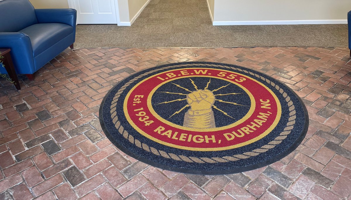 RugRatsInc's tweet photo. Custom shapes that make a statement! ⚡️

Check out these new Piazza Logo Mats we just delivered for @IBEW553 in Raleigh/Durham. From classic rounds to this striking custom triangle, we don't just do rectangles.

The Piazza style is heavy-duty, UV-resistant, and built for high-traffic areas. 🇺🇸

See more: https://t.co/IcfiG2hFgx

#CustomRugs #IBEW #RaleighDurham #Manufacturing #SmallBiz #LogoMats #MadeInUSA