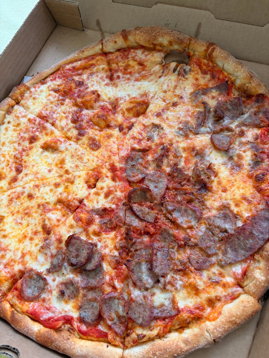 happylaura's tweet photo. We don’t order pizza too often. Today, it is an extra “holy” pizza. Still good, but the extra hole tells me someone was rushing. #Naples New York Pizza and Pasta. #meh 😂 https://t.co/9aIAoqxVWB