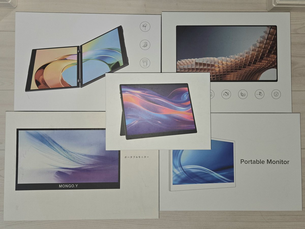 oretekigad's tweet photo. この2ヵ月で買ったポータブルモニター5枚(うち1枚はデュアル)。1枚は会社用で常時かばん。3枚は書斎デスクに常設(うちデュアルはリビングで仕事する場合の移動用)。1枚はメルカリで買った性能悪く使えないから出品中。もはやYouTuberでもやろうかな🤣
仕事は出来ないくせに、装備は揃えたがる俺。笑 https://t.co/rsN6WDqWmM