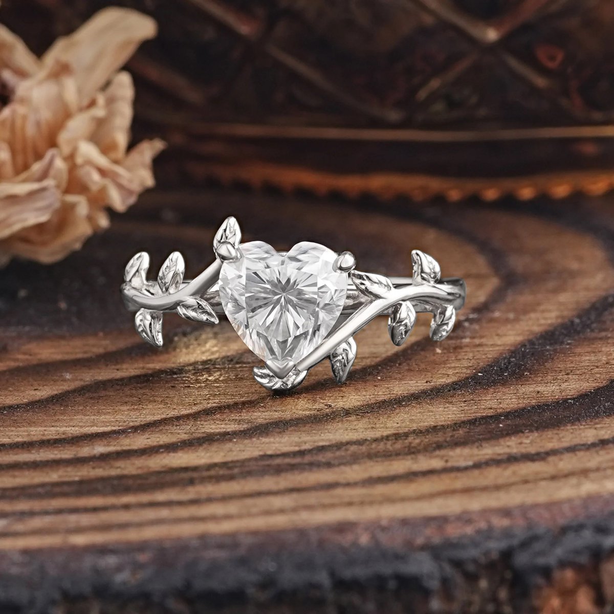 Romalarjewelry's tweet photo. Fully embracing the hopeless romantic vibes. 🏹💚 A unique Heart-Cut Moissanite wrapped in leaves. Cue the fairytale! #HeartRing #ROMALAR https://t.co/aPHZsoKswV