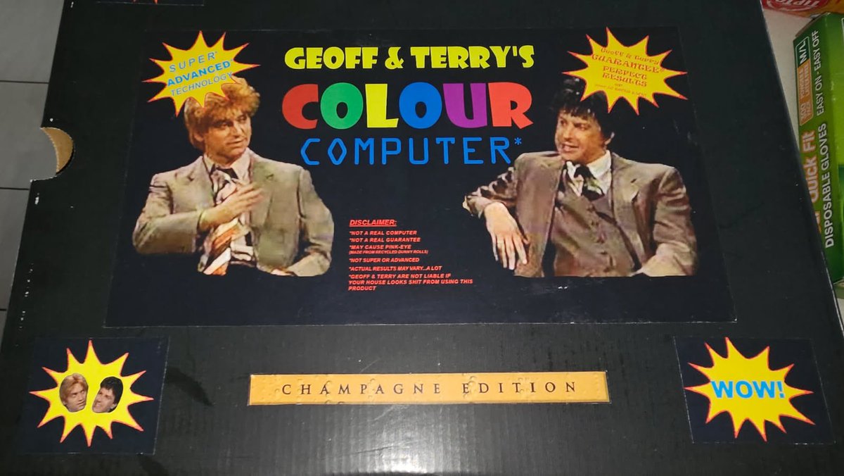Lungbarrow's tweet photo. Hey @WorkingDogAus - just wanting to make sure that I have received an officially licensed Geoff and Terry’s Colour Computer… apparently it is the champagne addition? Mate got it for me as a Birthday present, I just want to make sure he wasn’t ripped off his $50 bucks… https://t.co/zf6l7e0OIY