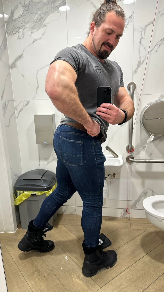FatBubbleButt20's tweet photo. Caught this Viking beast @VikingWill85 flexing in the john—gray tee barely containing these huge fucking arms, blue jeans gripping that massive white cop-style bubble butt like it's trying to escape #VikingWill85 #BigWhiteMuscle #BubbleButtDaddy #TightJeansAss https://t.co/scwwSFK1rL