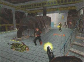 This prerelease screenshot of Control is found in a Swedish catalog of N64 games. It shows a number of differences from the final game including hanging lights, lack of hand on the PP7, a different door, and oil drums. Ignore the brown blob at bottom that's Brosnan's head. [1/7]