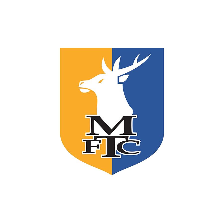 Watching the Arsenal game and if you squint your eyes, the Mansfield badge looks like someone hitting the dab