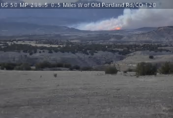 JaySullyFromCO's tweet photo. The south end of the #24fire is very active Flames are visible from 50 HWY in Penrose and from the cdot camera. #COwx https://t.co/TDxC1J2FMP