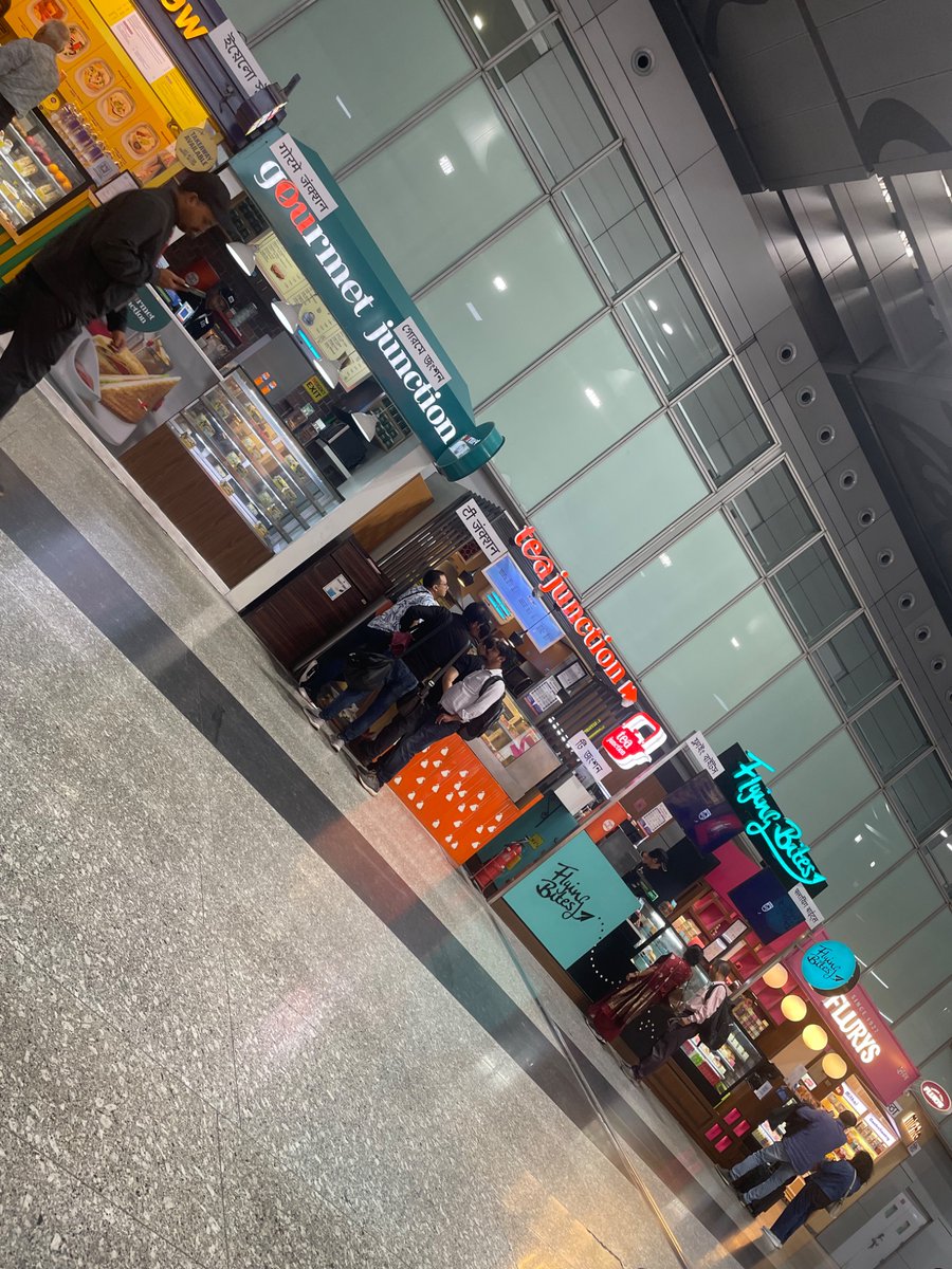 johnraja's tweet photo. Calcutta airport must be having the highest density of retail shops inside the domestic terminal. Nice to see local brands sharing space with national and international ones. https://t.co/MHnKph2Otx