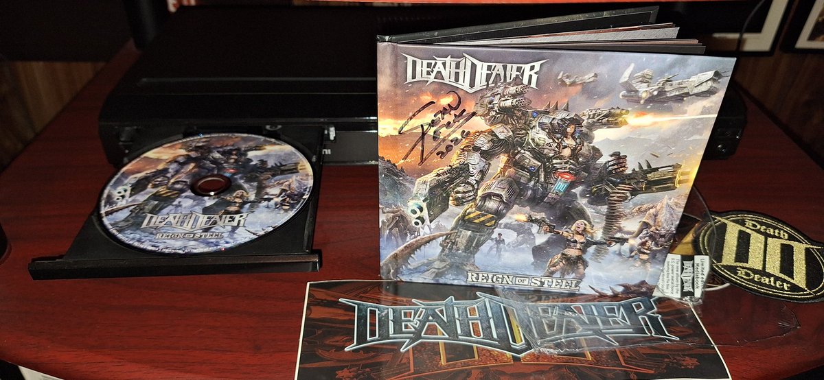 WillPhanto1's tweet photo. Saturday night CD: Reign of Steel, by the mighty @DeathDealerband 
Thanks Sean Peck for the signed CD! https://t.co/wxcWArDc4P