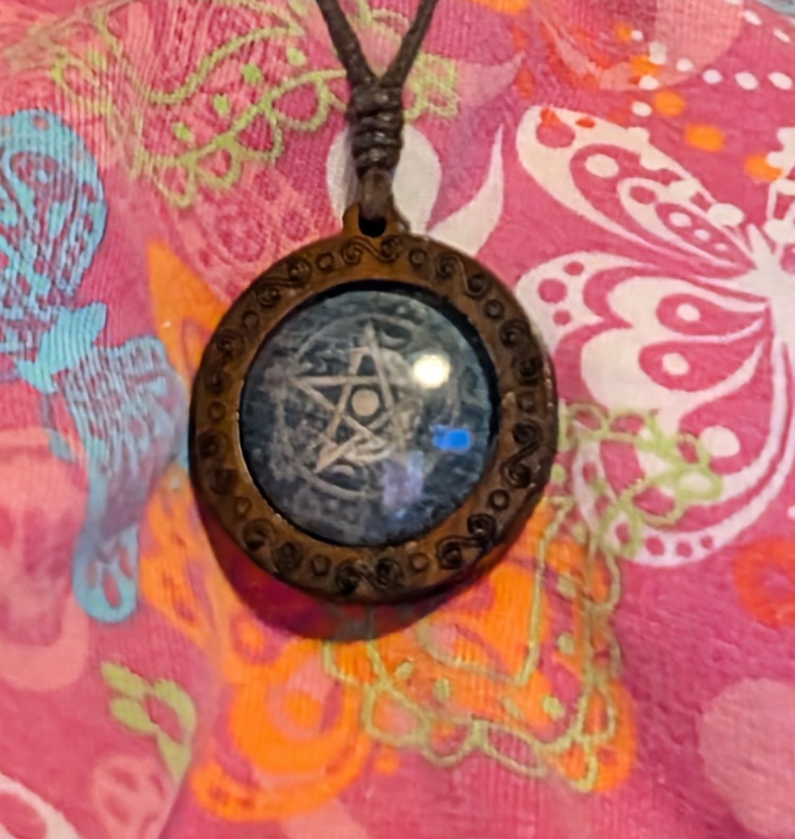 TheRainbowZee's tweet photo. @TBLightning I got this Witchy pendant from Temu on Tuesday. Wore it for the W against @SeattleKraken.

Wearing again tonight against @Canucks 

You're Welcome🤣
#gobolts https://t.co/qFmLXB5Ol8