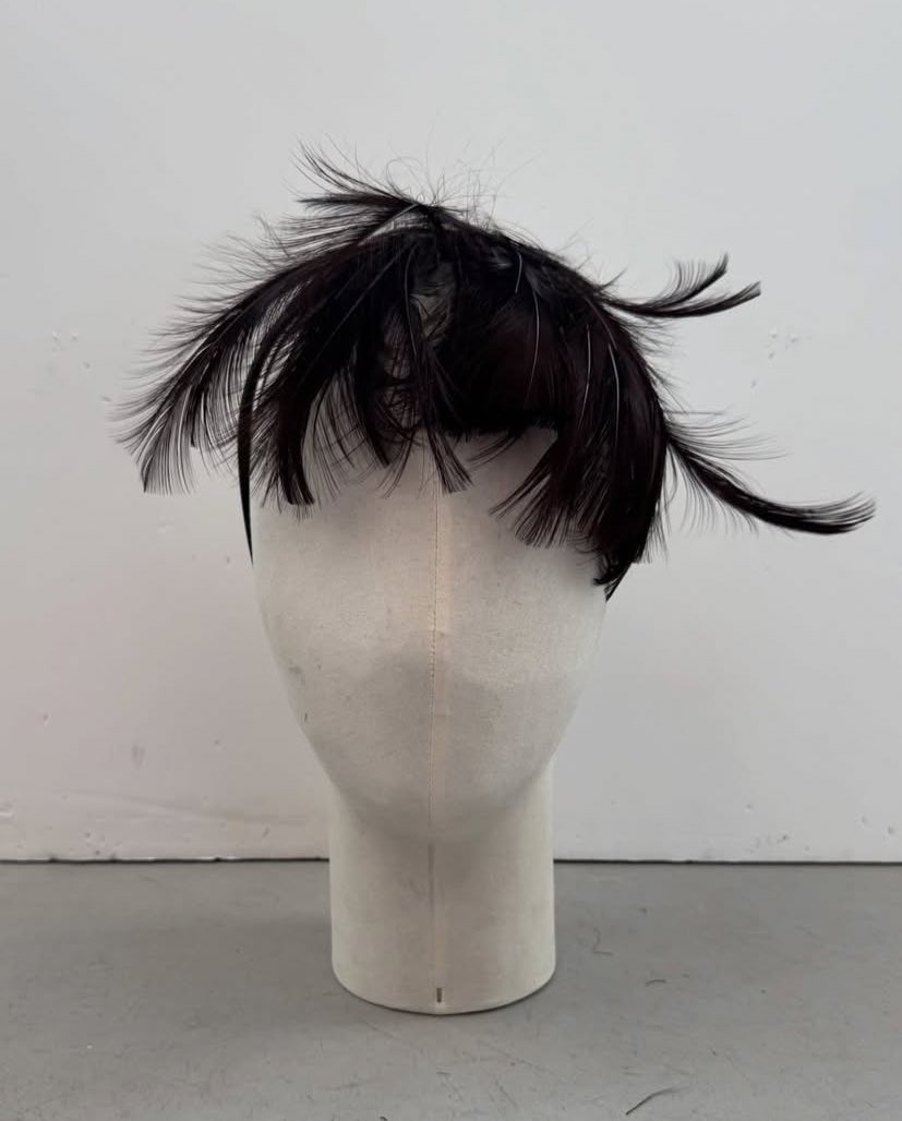 quero a peruquinha de penas da Celine