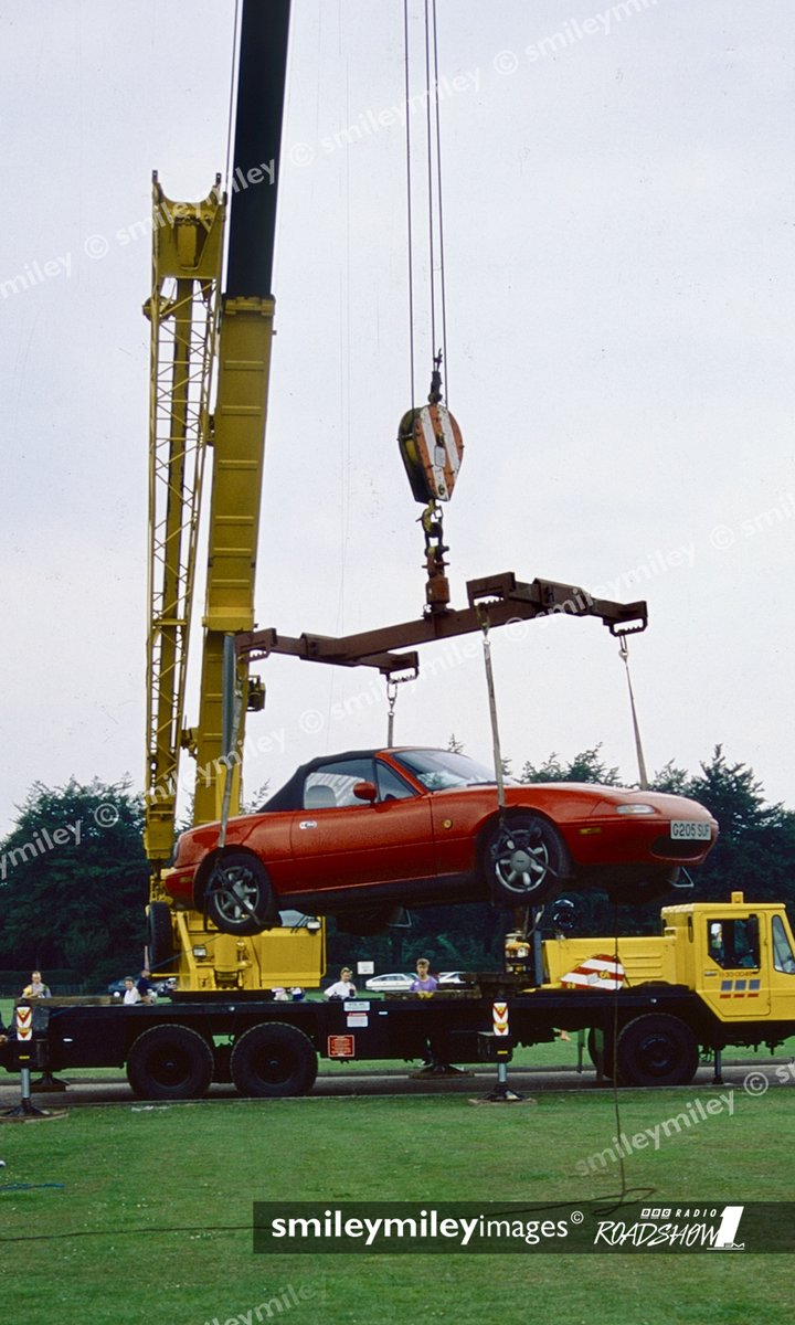smileymileyuk's tweet photo. @MikeReadUK @ Federation Cup Tournament #NottinghamTennisCentre #Radio1Roadshow July 1991 #SmileyMiley cranes Mike's Mazda sports car on top of 50ft scaffolding tower. #HRHPrincessDiana was at event &amp; asked Mike,who's car was on tower.Only #Roadshow Mike wore trousers,not short😎 https://t.co/GWkEAacrKx