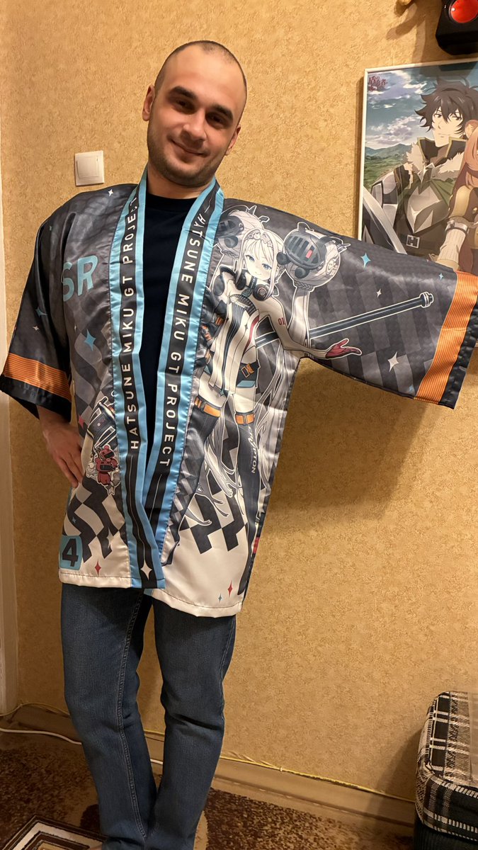 MaxSH1997's tweet photo. Hello everyone!

I continue to cheer for @goodsmileracing in #SuperGT!

I have a situation. At my request, my friend who was in Tokyo, he bought me a Happi with Racing Miku 2026, This is my first Happi - she's cool, I wanted her at first sight

#fightGSR
1/5 https://t.co/kuyiPZNhRH