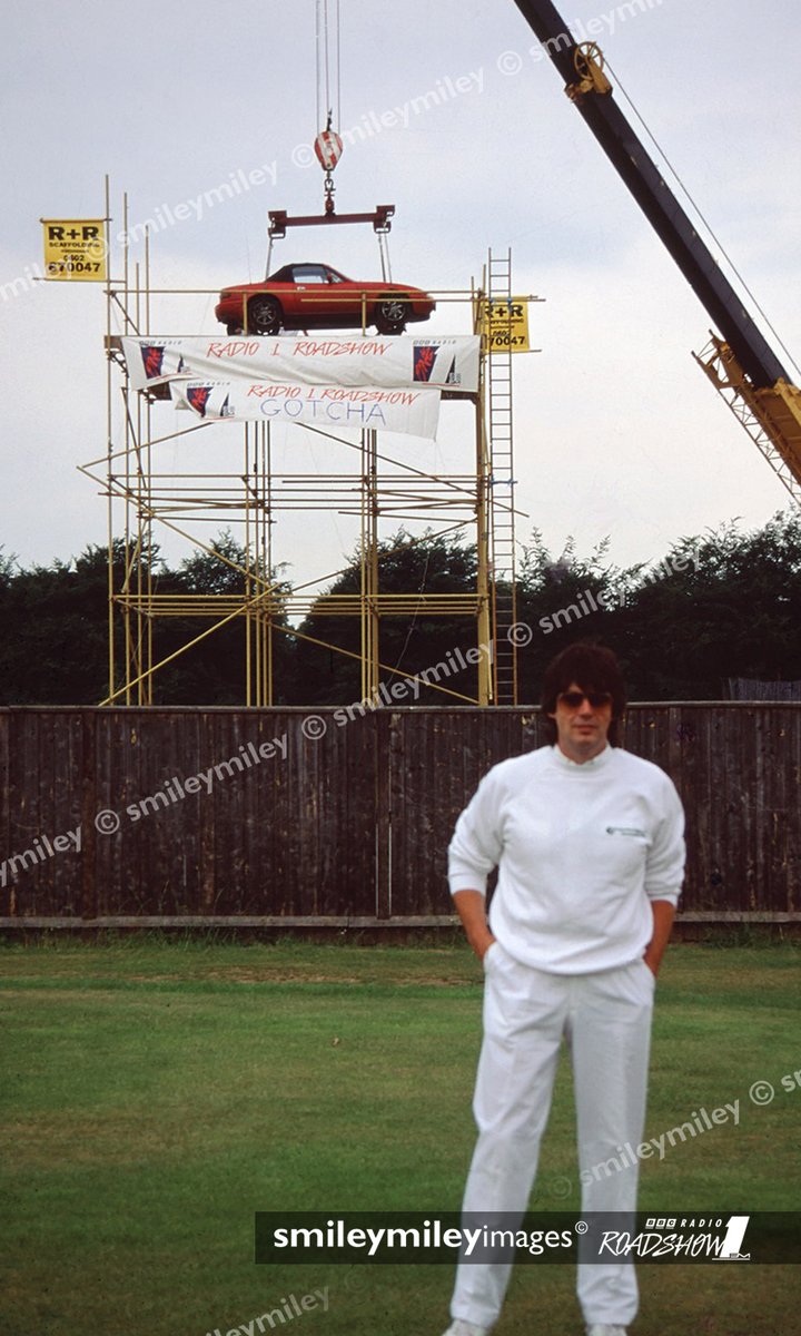 smileymileyuk's tweet photo. @MikeReadUK @ Federation Cup Tournament #NottinghamTennisCentre #BBCRadio1Roadshow July 1991. #SmileyMiley cranes Mike's sports car on top of 50ft scaffolding. #HRHPrinessDiana was at event &amp; asked Mike who's car on tower. Sadly his!. Only #Roadshow he wore trousers,NOT shorts😎 https://t.co/pKfou5ElN4