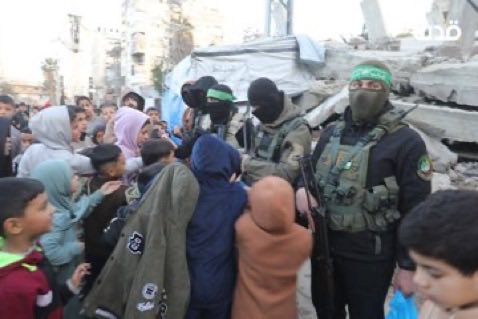 TheSaviour's tweet photo. 🚨🇵🇸 Hamas distribute sweets to displaced children during Eid al-Fitr in Nuseirat Camp, central Gaza Strip https://t.co/lw1c7CWaqu