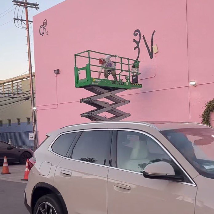 Olivia Rodrigo’s #OR3 mural is being written on.