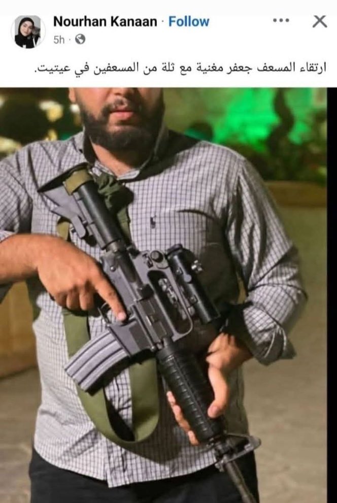 A paramedic holding a first aid kit.