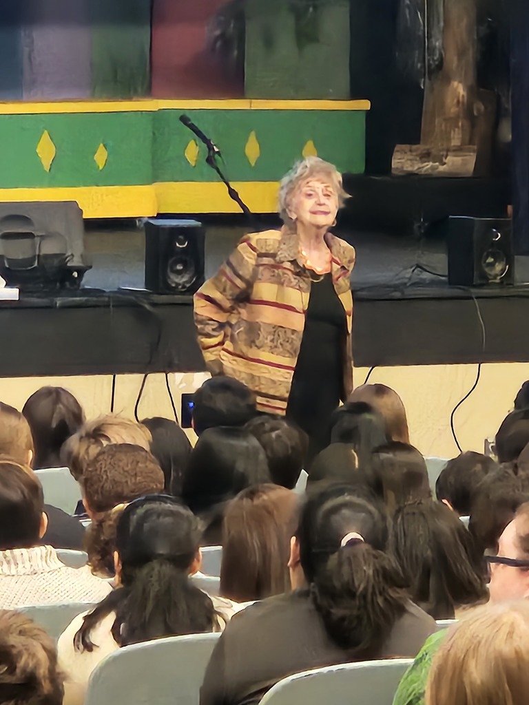 WAMSBTSD's tweet photo. Our 7th-grade students had the profound honor of listening to Tova Friedman, one of the youngest survivors of Auschwitz.    Tova’s firsthand account of resilience was powerful. She shared a message of courage, the dangers of hatred, and the absolute necessity of kindness! https://t.co/6ozFHI7ZYZ
