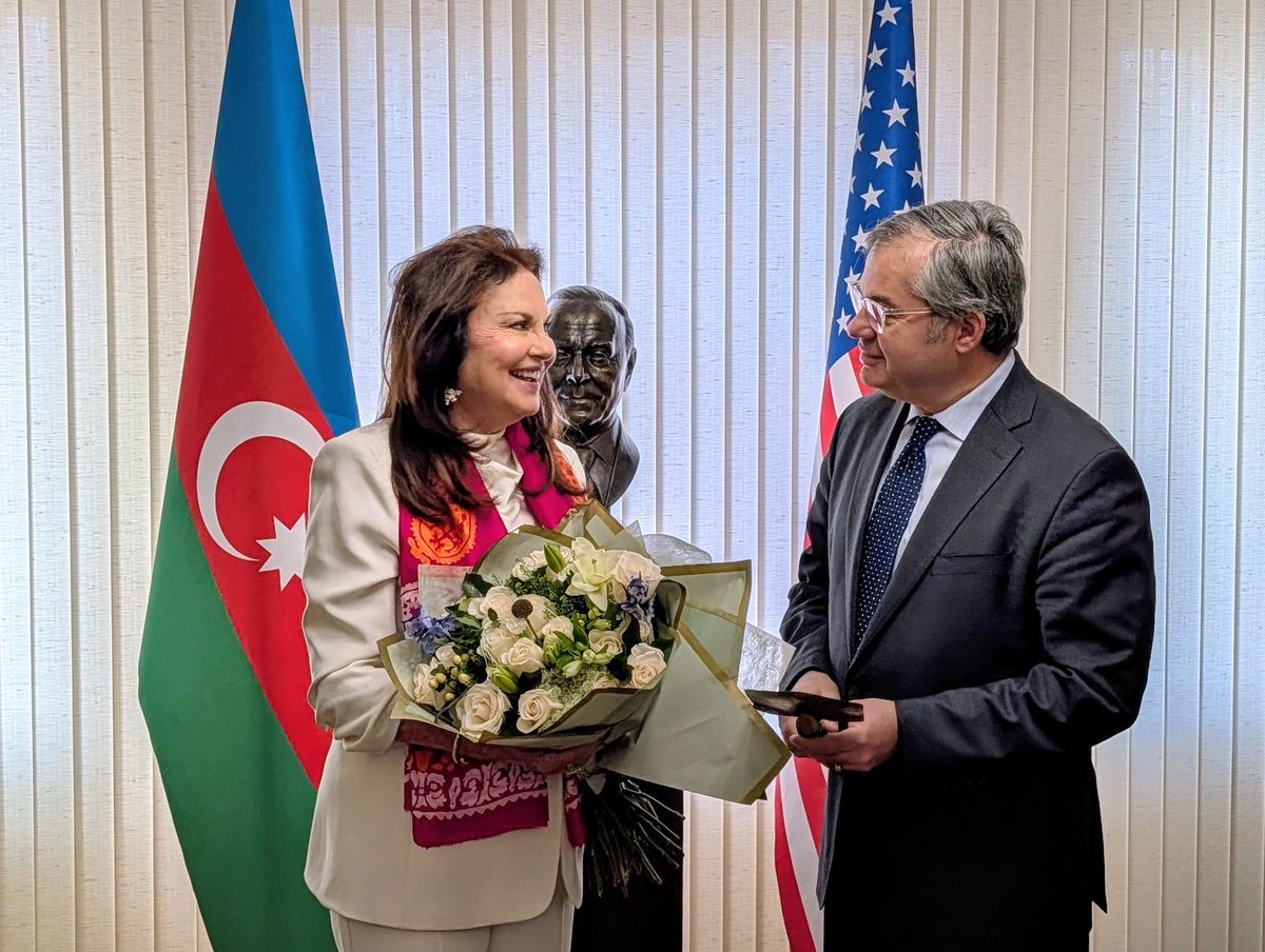 hazar_khazar's tweet photo. Planted together with @RootsofPeace &amp; @WorldFoodPrize winner Heidi Kuhn a symbolic white rose @azembassyus to celebrate #Novruz in 🇺🇸

A shovel, made from cleared mine remnants in Garabagh 🇦🇿, symbolizes a peacebuilding through agriculture. https://t.co/ZFgWYM8wRi