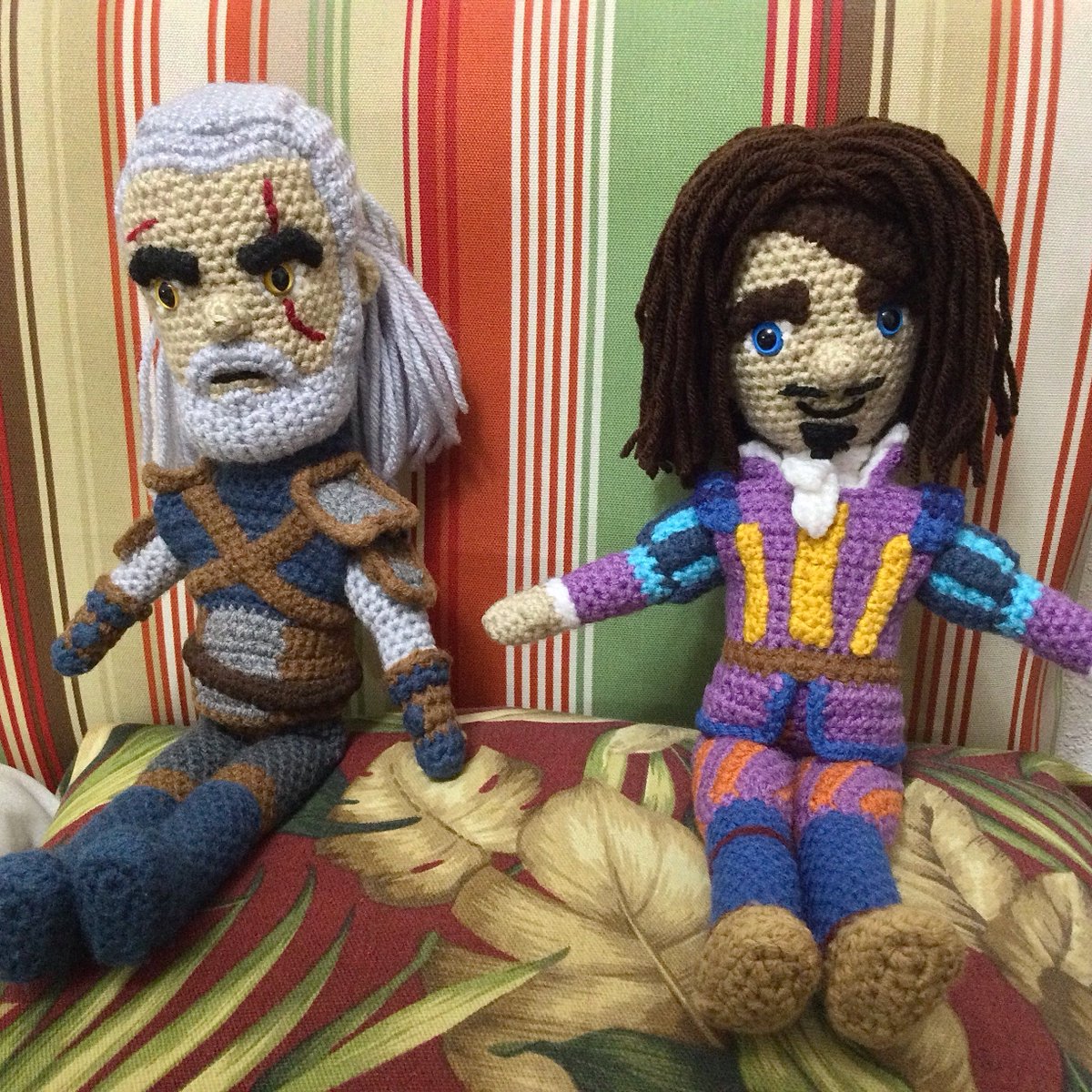 JBcrochetwizard's tweet photo. My Geralt of Rivia doll that I made in 2020 and Dandelion/Jaskier in 2021.  Each crochet amigurumi measures 13.5 - 14.5” tall.

#crochet #thewitcher #amigurumi https://t.co/AIAYNz2otQ