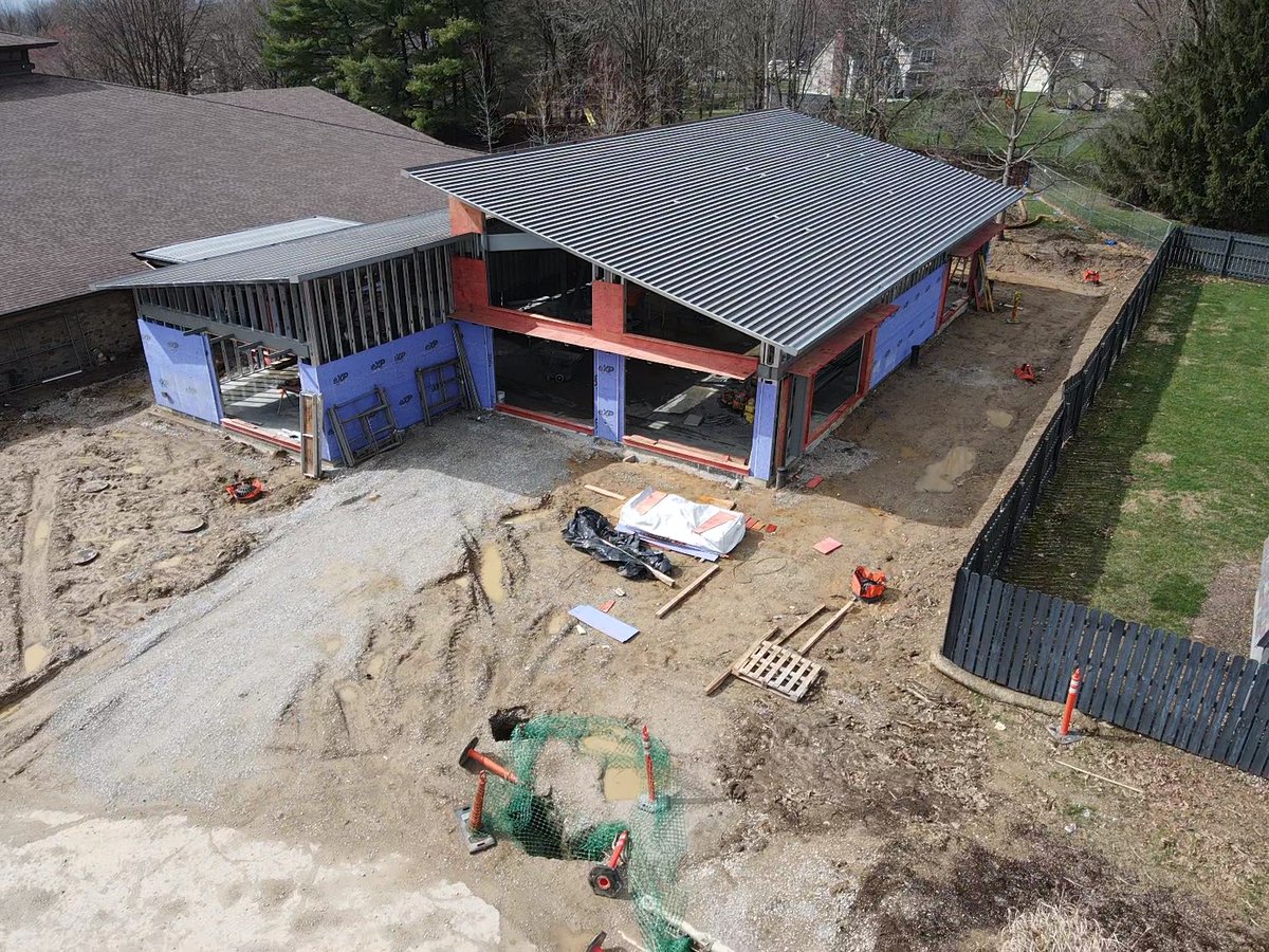 kramercorp's tweet photo. Huron Hall is really taking shape over at Avon-Washington Township Library!  A new solar panel system is installed on the existing roof, alongside a geothermal system underground, with the goal being to offset the energy usage of the addition.Stay tuned for more exciting updates! https://t.co/fmhwxFwXqZ