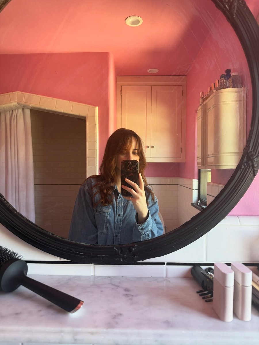 Rachel Brosnahan debuts a new haircut via Instagram: "Fresh chop, messy bathroom. Thanks Owen Gould ✂️"